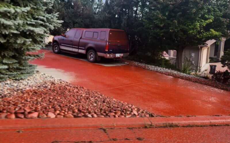 This area was painted with red fire retardant dropped by a wildfire plane in Peachland, B.C., during the wildfire season in 2025.